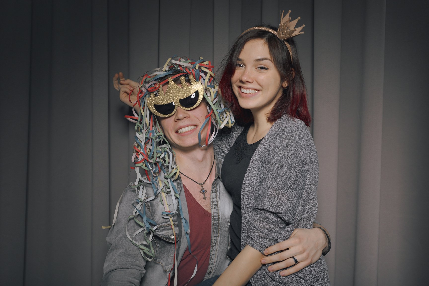 Happy couple in a photo booth